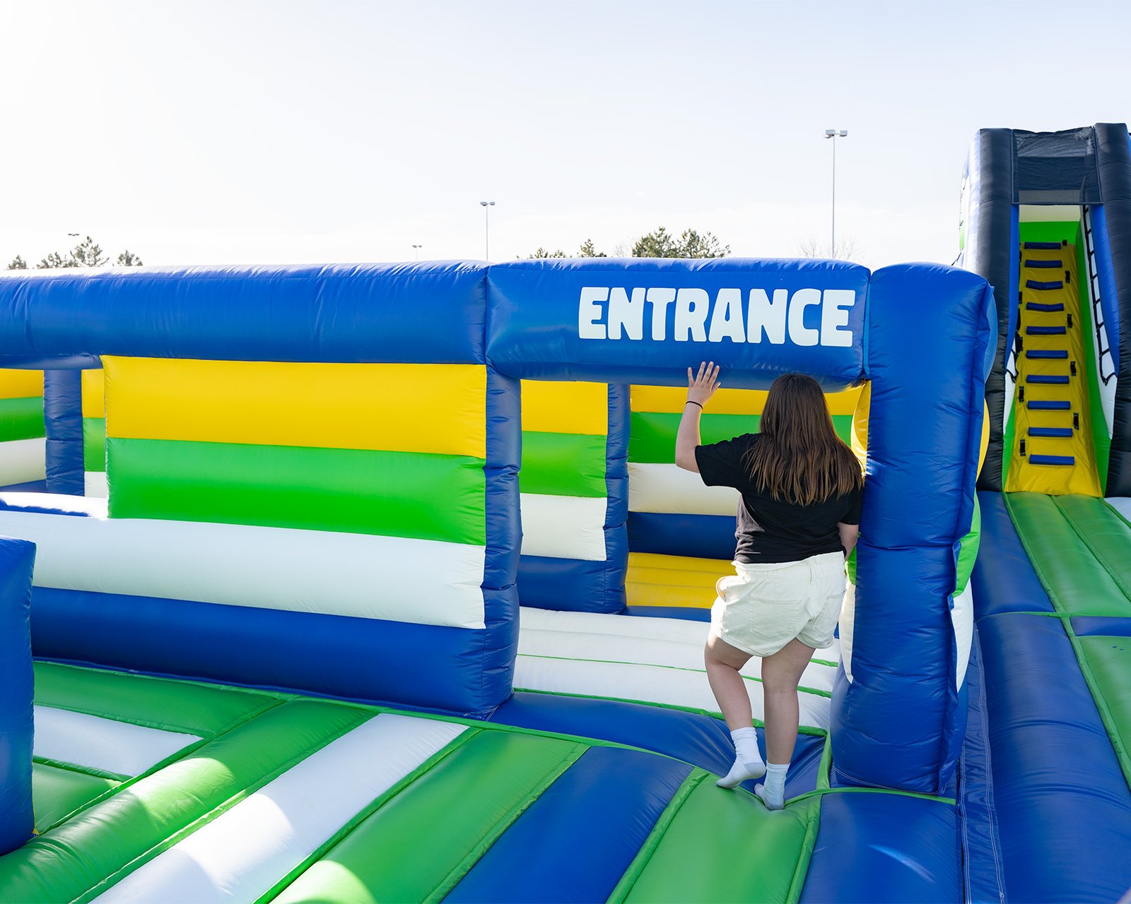 Girl entering a maze at at one of the world's largest bounce houses