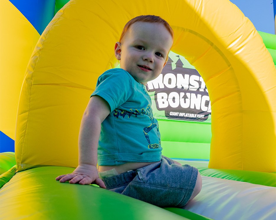 Little boy playing on one of the world's largest bounce houses